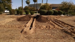 Trenching among garden beds and laying pipe - 11/19/2016